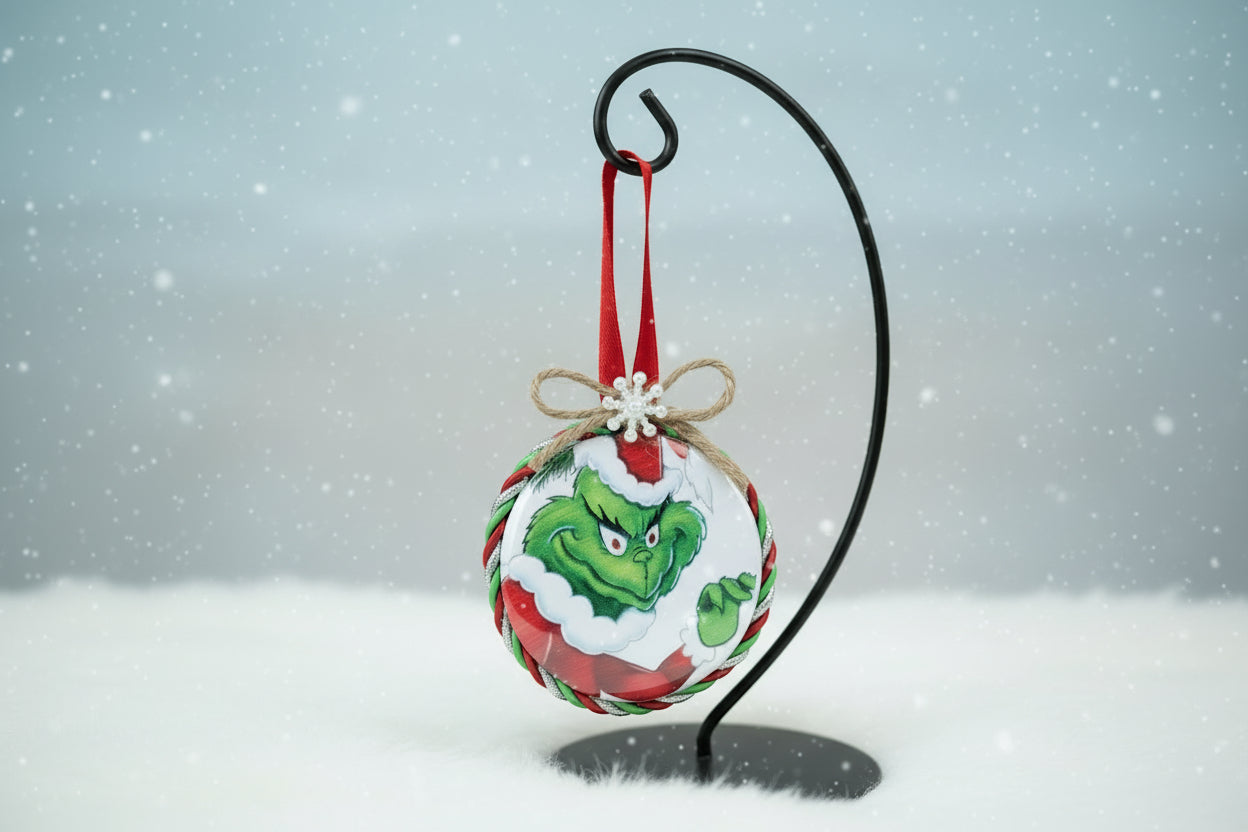 Christmas ornament with Grinch design on a white background