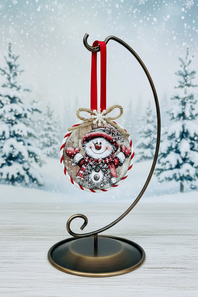 Christmas ornament with a snowman design on a white background