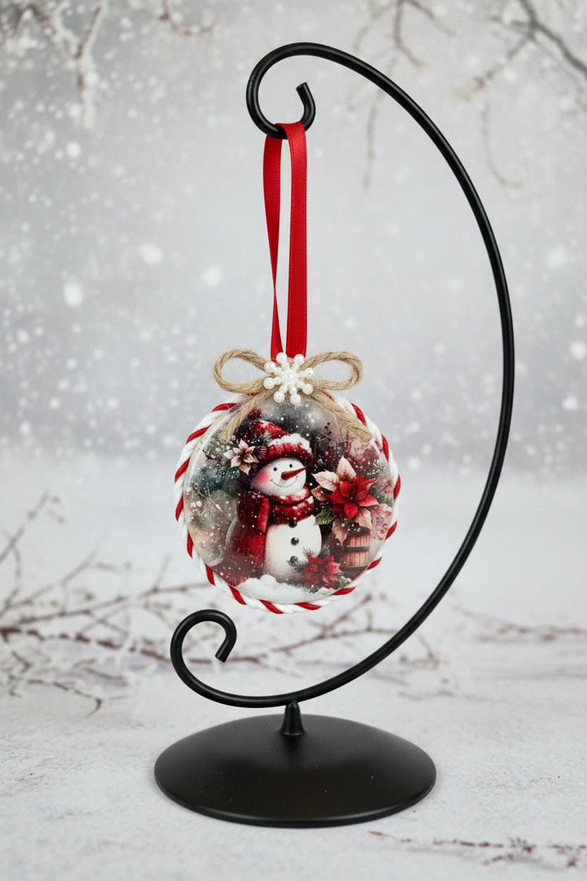 Christmas ornament with a snowman design on a white background