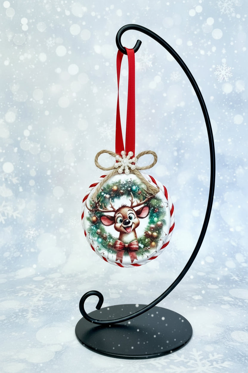 Christmas ornament with a reindeer design on a white background